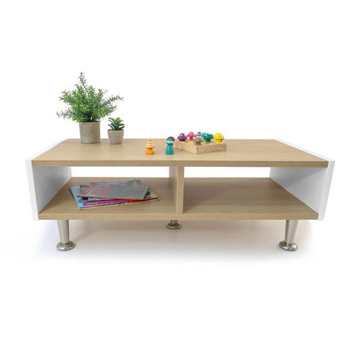 Whitney Brothers elevatED™ Community Table, modern children's activity table with a wooden top, white side panels, and metal legs, decorated with books, plants, and colorful toys.