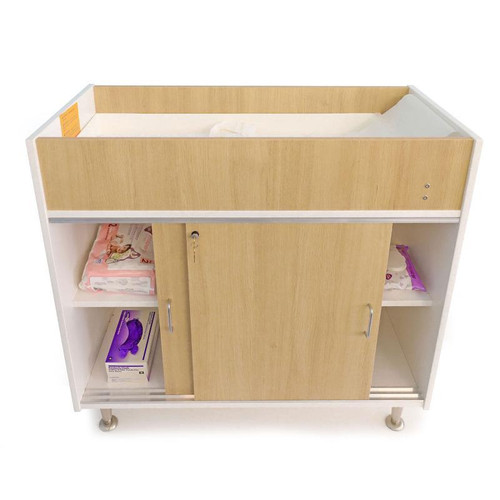 Whitney Brothers elevatED™ Infant Changing Cabinet, wooden baby changing table with storage shelves and sliding door.
