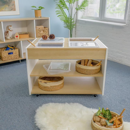 Whitney Brothers elevatED™ Mobile Sensory Table, a wooden sensory table with transparent containers and natural accessories for children's sensory play.