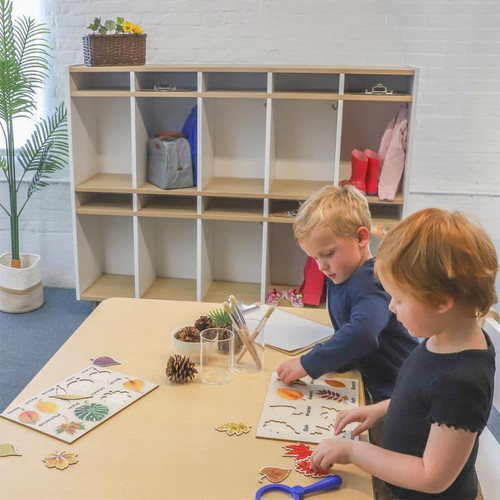 Whitney Brothers elevatED™ 10 Section Coat Locker, a modular storage unit with individual compartments for children's belongings, placed in a classroom setting.
