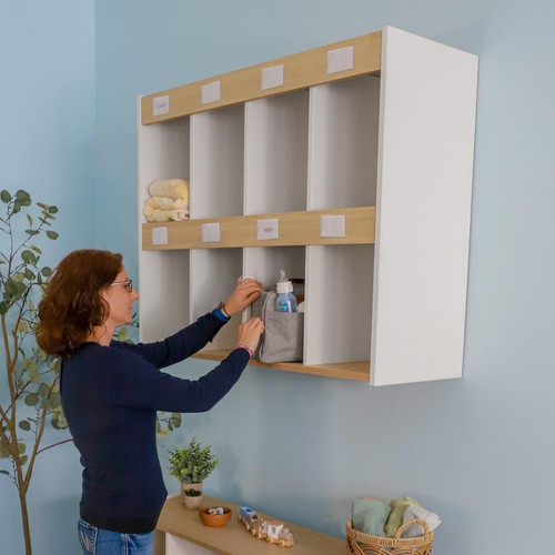 Whitney Brothers elevatED™ Wall Mount Diaper Bag Organizer, white and natural wood wall-mounted storage unit with multiple compartments for baby essentials.