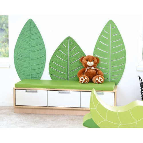 Moje Bambino Leaf Wall Decor, green leaf-shaped wall decor for children's room with a teddy bear sitting on a green bench.