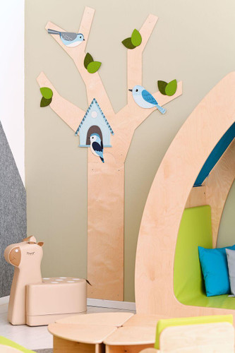 Moje Bambino Leaves for Woodland Tree Interactive Wall Decor, wooden tree with colorful bird and leaf accents in a children's room.