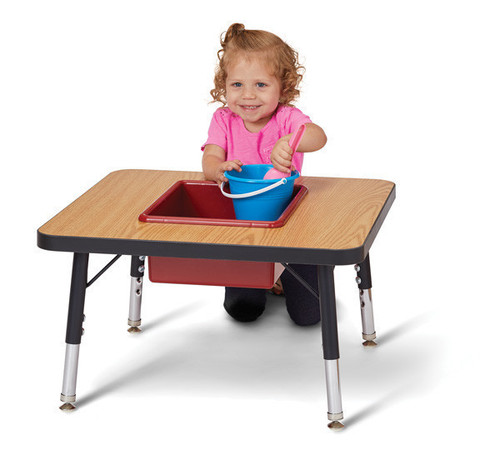 Jonti-Craft Adjustable Preschool Sensory Table, a young girl playing with a bucket and toys on the sensory table.