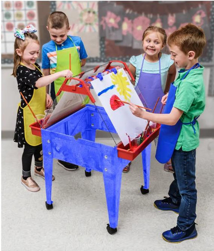 Childbrite Children's Basic Art Easel w/ Casters, kids happily painting on an easel in a classroom.