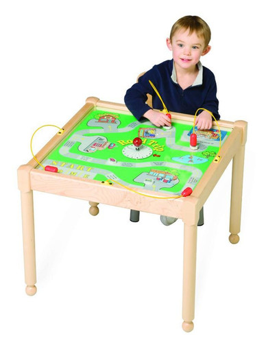 Playscapes Road Trip Square Activity Table - 22" H, a young boy playing with a table-top game with a colorful road map design and miniature cars.
