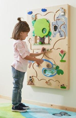 HABA Pro The Forest Activity Wall Panel, a children's interactive educational wall-mounted toy featuring various forest-themed elements for play and development.