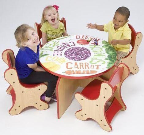 Playscapes Veggie Children's Play Table, children playing and laughing around a colorful table with vegetable illustrations.
