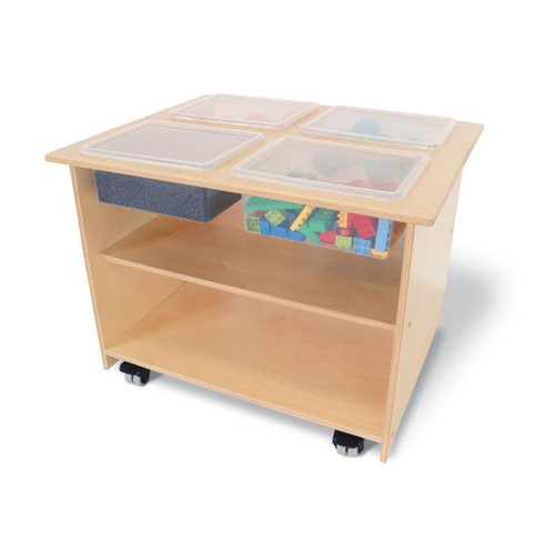 Whitney Brothers Mobile Sensory Table With Trays and Lids, wooden sensory table on wheels with four storage trays on top and a shelf underneath containing building blocks.