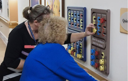 Playscapes Spindle Match Small Ambient Activity Wall Panel, interactive activity panel with colorful spindles for sensory and cognitive development.