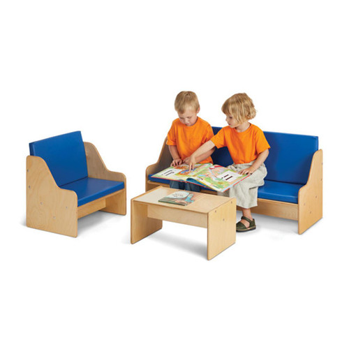 Jonti-Craft Young Time Living Room Set, miniature wooden furniture with blue cushions, children sitting and playing with a colorful book on the sofa and table.