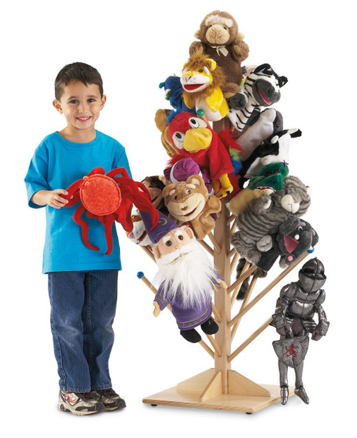 Jonti-Craft Puppet Tree, display of various colorful puppet characters including animals, a wizard, a knight, and a crab on a wooden puppet stand with a smiling boy in a blue shirt holding a red crab puppet.