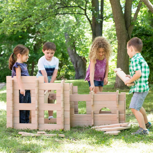 Guidecraft Notch Wooden Blocks Set - 89 Pc, children playing outdoors constructing with wooden building blocks.
