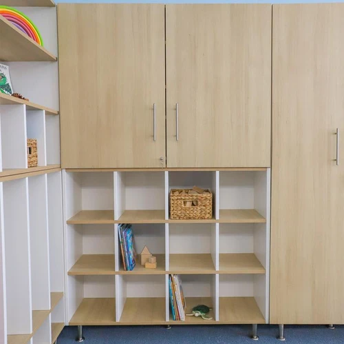 Whitney Brothers elevatED™ 12 Cubby Backpack Storage Cabinet, light wood finished cubby storage with shelves and doors, ideal for classroom organization and student backpack storage.