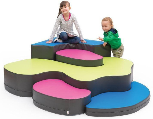 Novum Jigsaw Puzzle Corner Soft Play Climber, colorful foam climbing structure with pink, blue, green, and gray sections, designed for children's play and climbing activities.