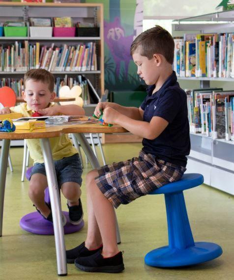 Playscapes Active Learning Wobble Stool, 14 inches high, in use by children in a classroom for active seating and improved focus.
