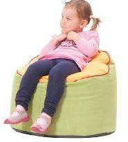 Novum Ladybug Bean Bag Seat, a young girl sitting on a colorful bean bag chair with a soft, plush surface and a ladybug design.