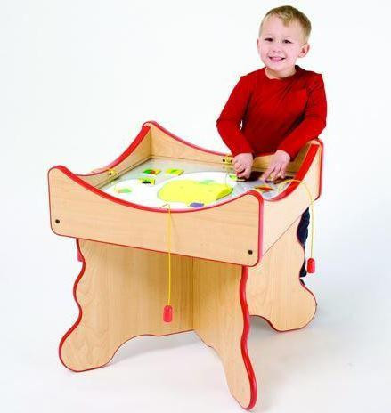 Playscapes Veggie Visage Match Activity Table, a wooden educational toy with a colorful surface for matching vegetable shapes, designed for engaging children's learning and play.