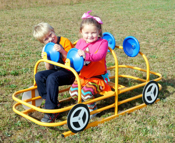 Infinity Playgrounds Playground Passenger Car, children playing and sitting in a yellow and blue playground passenger car on grassy field.