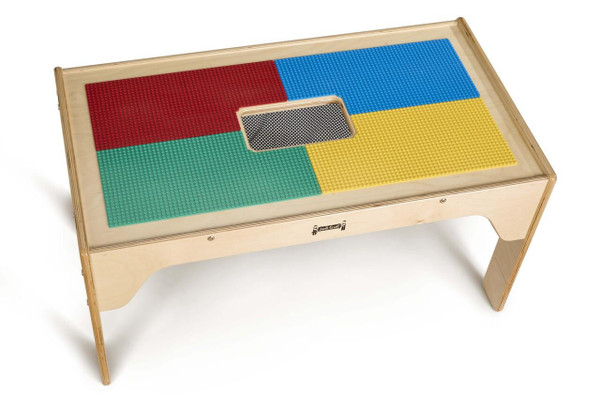 Jonti-Craft Wooden LEGO® Rectangle Storage Table, wooden table with colorful LEGO® baseplate surface in red, blue, green, and yellow sections with a center handle, suitable for children's play and storage.
