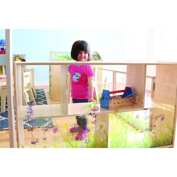 Whitney Brothers Nature View Acrylic Back Storage Cabinet 30" H, child inside a colorful play area with a nature-themed acrylic back panel featuring flowers and grass design.