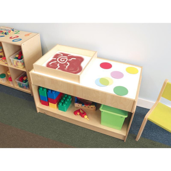Whitney Brothers Sand Box For Kid's Light Tables, wooden sandbox with colorful sand and bubble wrap covering, suitable for educational and indoor play activities.