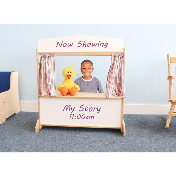 Whitney Brothers Deluxe Puppet Theater With Markerboard, a children's puppet theater featuring a young boy and a plush duck puppet.