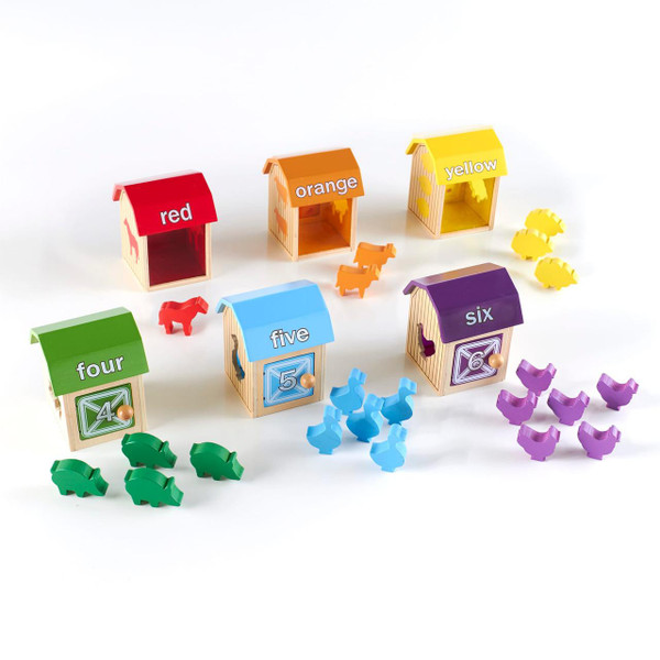 Guidecraft Barnyard Counting Boxes, colorful wooden nesting houses with numerals and animal figures for educational counting and number recognition activities.