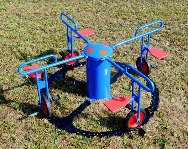 Infinity Playgrounds Infinity Cycle 4 Seat Carousel with Pedal Track, colorful outdoor playground equipment for children with four seats and pedal tracks on grass surface.