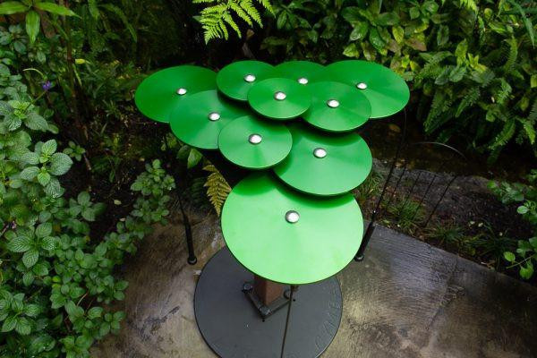 Freenotes Botanical Garden Ensemble, outdoor musical instrument with green lily-pad shaped percussion plates arranged in a musical sculpture.