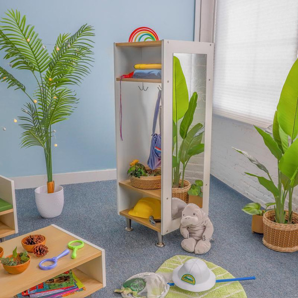 Whitney Brothers elevatED™ Dress Up Station, children's educational furniture with mirror, hooks, shelves, and colorful accessories in a playful playroom.