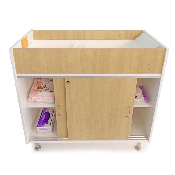 Whitney Brothers elevatED™ Infant Changing Cabinet, wooden baby changing table with storage shelves and sliding door.