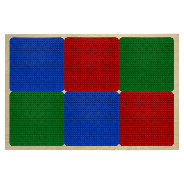 Wood Designs Duplo® Compatible Wall, colorful interlocking tiles in blue, red, and green on a wooden wall panel.