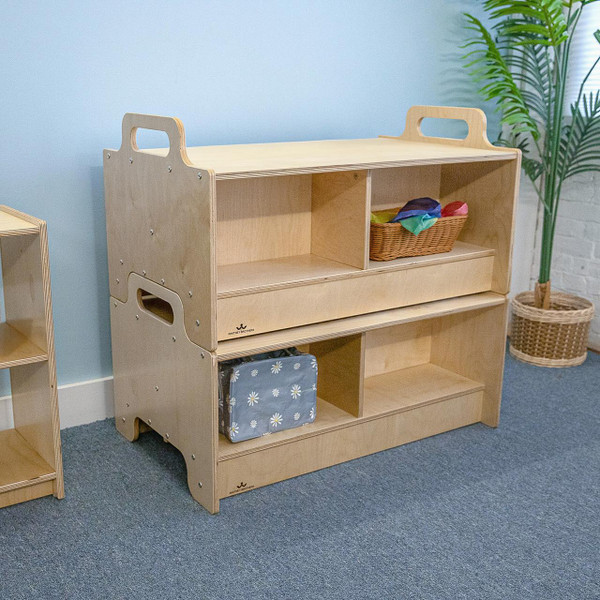 Whitney Brothers Stack-Able™ Bench, wooden stackable children's bench with multiple storage compartments and cut-out handles for easy movement in a classroom or playroom setting.