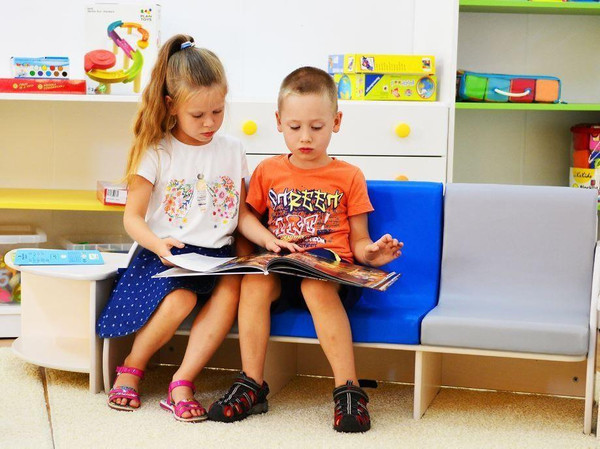 Moje Bambino Franek Foam Seats, children sitting on colorful foam seats in a playroom.