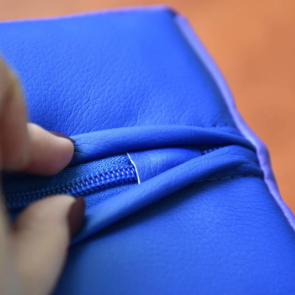 Children's Factory Inchworm Soft Play Climber - Momma or Baby, close-up image of blue textured material with zipper detail.