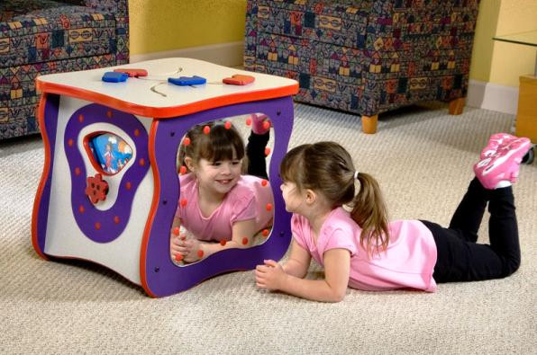 Playscapes Toddler Oasis Wooden Activity Cube, children playing and crawling through the colorful wooden activity cube.