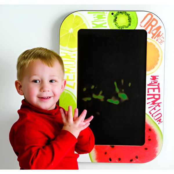 Playscapes Fruit Magic Hands Heat Sensitive Wall Panel, colorful wall art featuring a heat-sensitive fruit design with a child smiling and touching the panel.