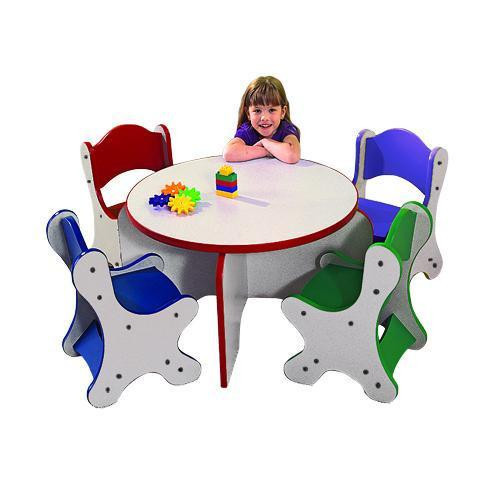 Playscapes Friends Kids Table, colorful children's table with five chairs and a young girl sitting at it, suitable for kids' play and activities.