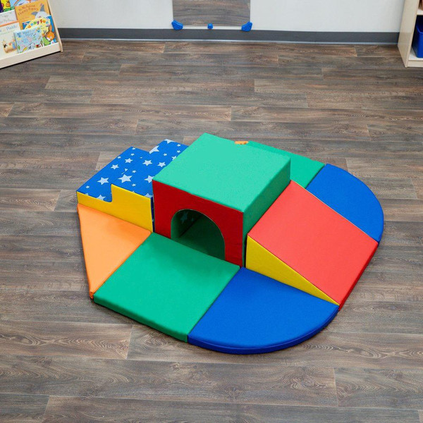 Children's Factory Soft Tunnel Foam Climber Set, colorful foam play structure with a tunnel, cube, and various shaped soft mats on a wooden floor.
