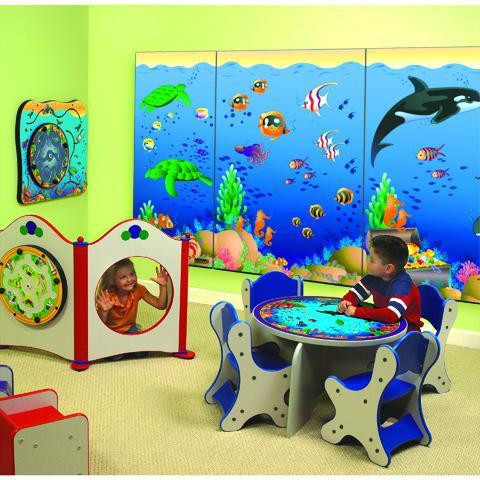 Playscapes Seascape Wall Mural, vibrant underwater scene with colorful fish, coral reefs, and marine life in a children's playroom.