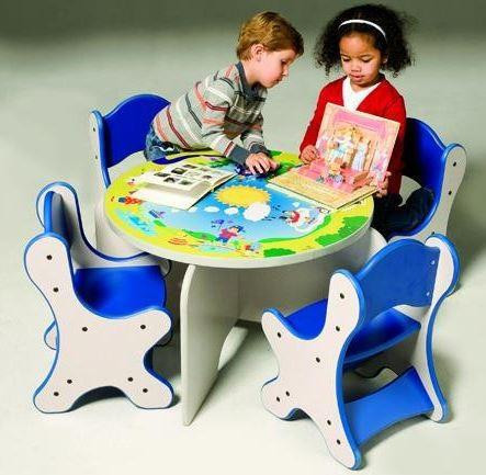 Playscapes Harmony Park Children's Play Table, colorful children's play table with a scenic design, surrounded by four blue and white themed chairs, used for children's educational activities and play.