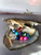 This is an akoya oyster with 5 round pearls AND 5 gems inside