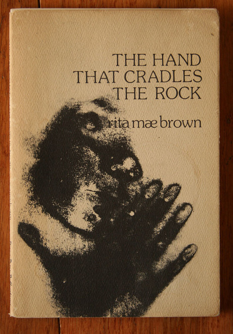 The Hand that Cradles the Rock by Rita Mae Brown 1974 Diana Press w/ Dust Jacket