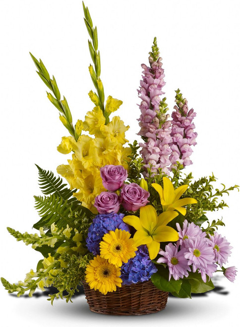 This generous basket filled with a variety of blooms is a gorgeous way to send caring thoughts. And hopes for brighter days ahead.