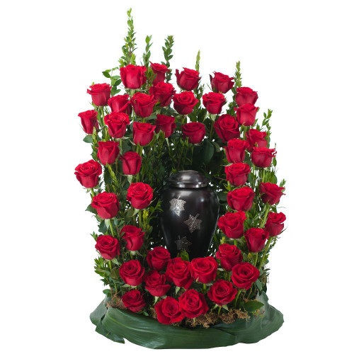 Red roses and premium foliage combine to make this elegant tribute.  
Approximately 18" W by 24" H