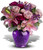 This gorgeous array of pink roses and fragrant pink lilies artistically arranged in a classic purple ginger jar is truly a gift to sigh for. They'll be talking about it for weeks. Lucky for you, the price is nice.