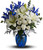 As open and bright as a winter's sky, this exquisite mix of white and blue blossoms would make a stunning birthday gift, or a superb Hanukah present for a favorite friend or family member. An eye-catching selection.