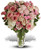 Women don't like roses, they looove them! This gorgeous array of light pink and cream roses in a dazzling clear glass vase is guaranteed to win her heart several times over. Love will definitely bloom.  Vase may vary but will be high end Vase.
