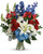 A colorful tribute for someone special, this brilliant bouquet of red, white and blue blooms is both perfectly patriotic and gorgeous.  This bouquet features blue hydrangea, red roses, white asiatic lilies, red alstroemeria, white carnations, blue delphinium, white snapdragons, huckleberry, dusty miller, aralia leaf and lemon leaf.  Delivered in a gathering vase.